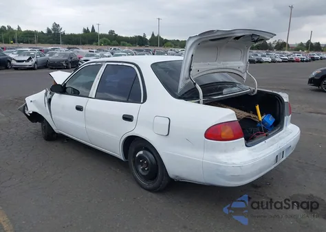 1999 Toyota Corolla Ve из США, поврежденный, VIN 1NXBR12E8XZ183983